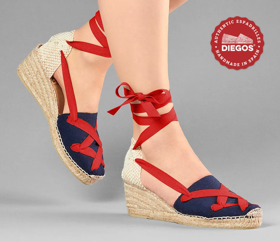 Alpargatas clásicas cordones Lola cuña alta azul marino
