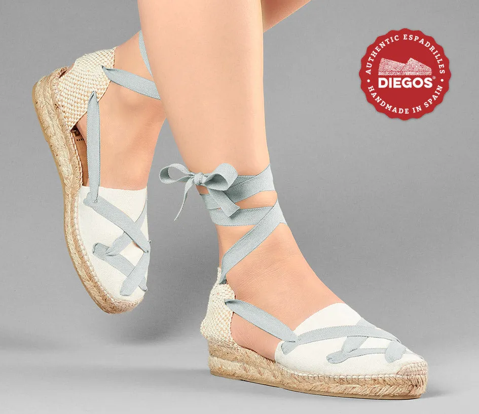 Alpargatas clásicas cordones Lola cuña baja marfil