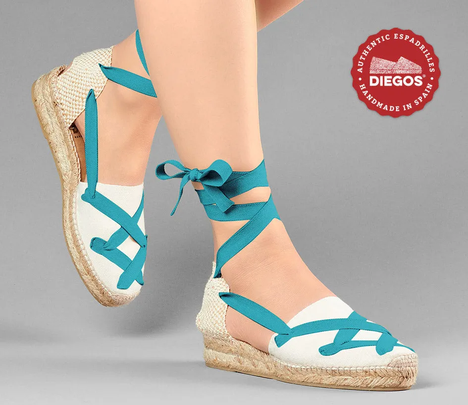Alpargatas clásicas cordones Lola cuña baja marfil