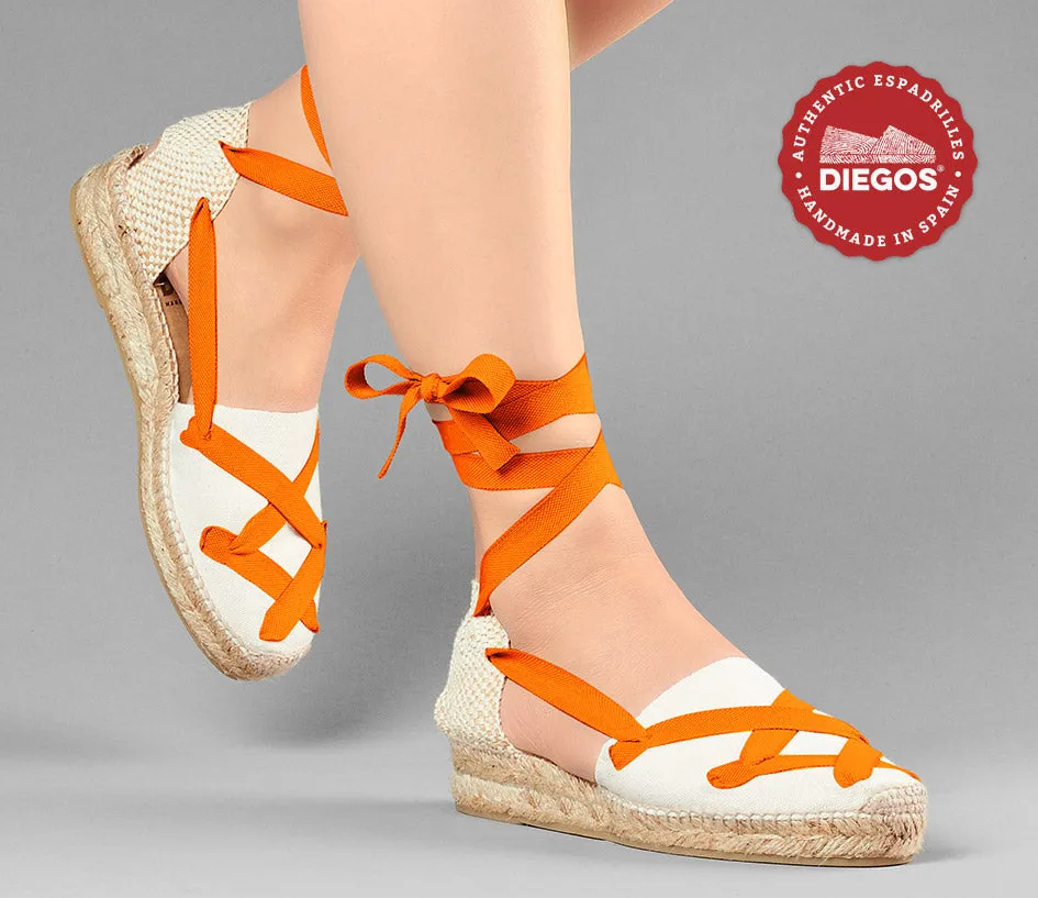 Alpargatas clásicas cordones Lola cuña baja marfil