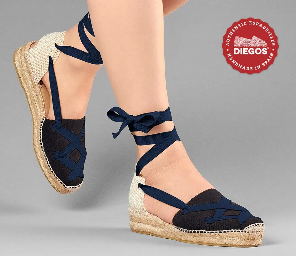 Alpargatas clásicas cordones Lola cuña baja negro