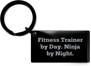 GIFTVILLE & SURPRISE Fitness Trainer Keychain, Funny Quote, 'Fitness Trainer By Day. Ninja By Night.', Gifts from Friends for Fitness Trainer, Unique Father's Day Unique Gift