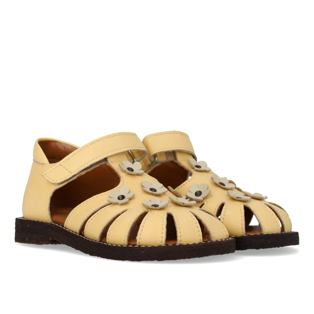 Sandal with floral applications