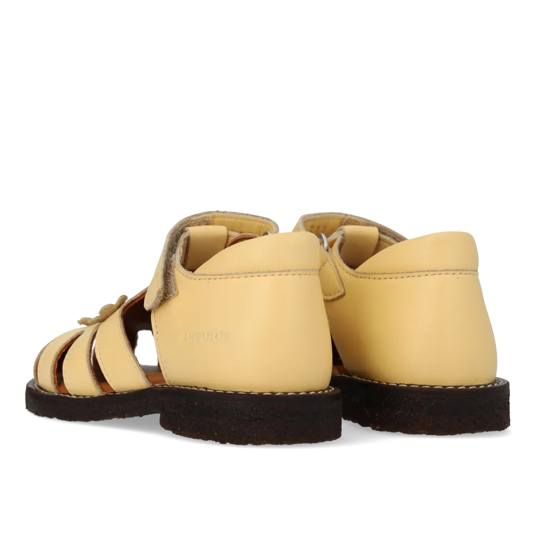 Sandal with floral applications